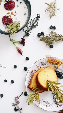 delicate breakfast arrangement with cake and berries