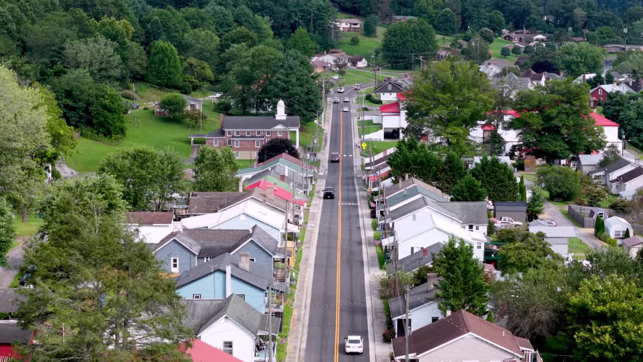aerial tilt up to homes in mill town Fries Virginia
