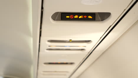 No-Smoking-and-Fasten-Seatbelt-light-coming-on-in-passenger-aircraft