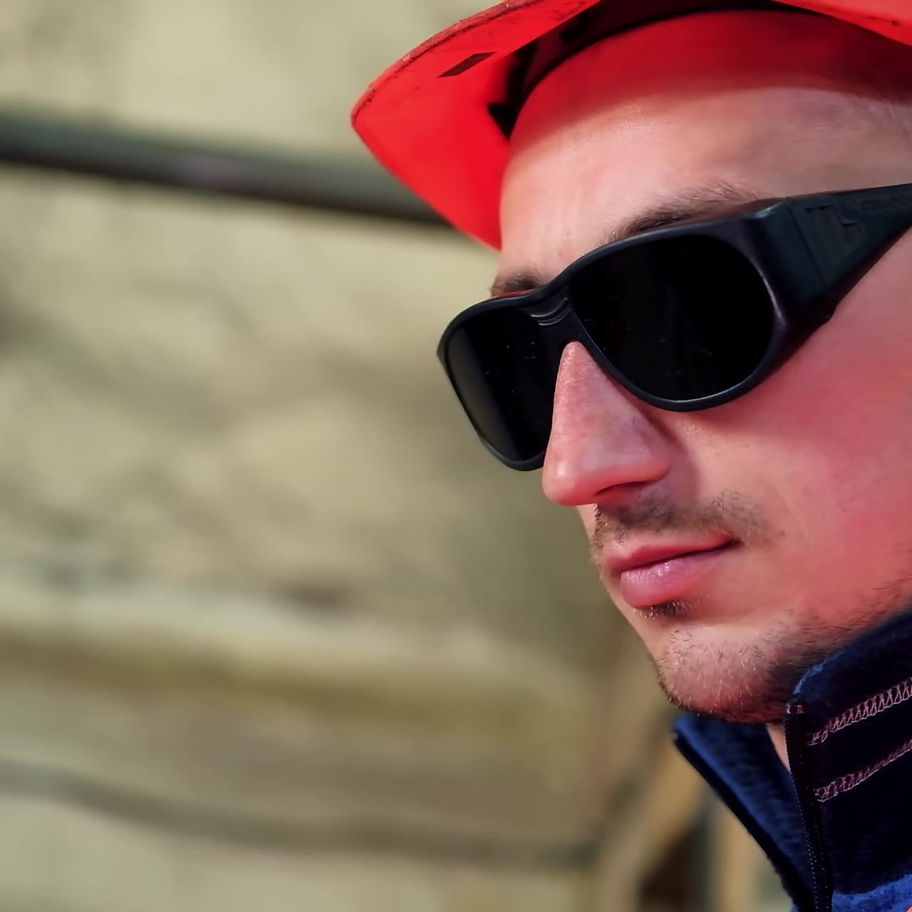 Industrial worker cutting metal