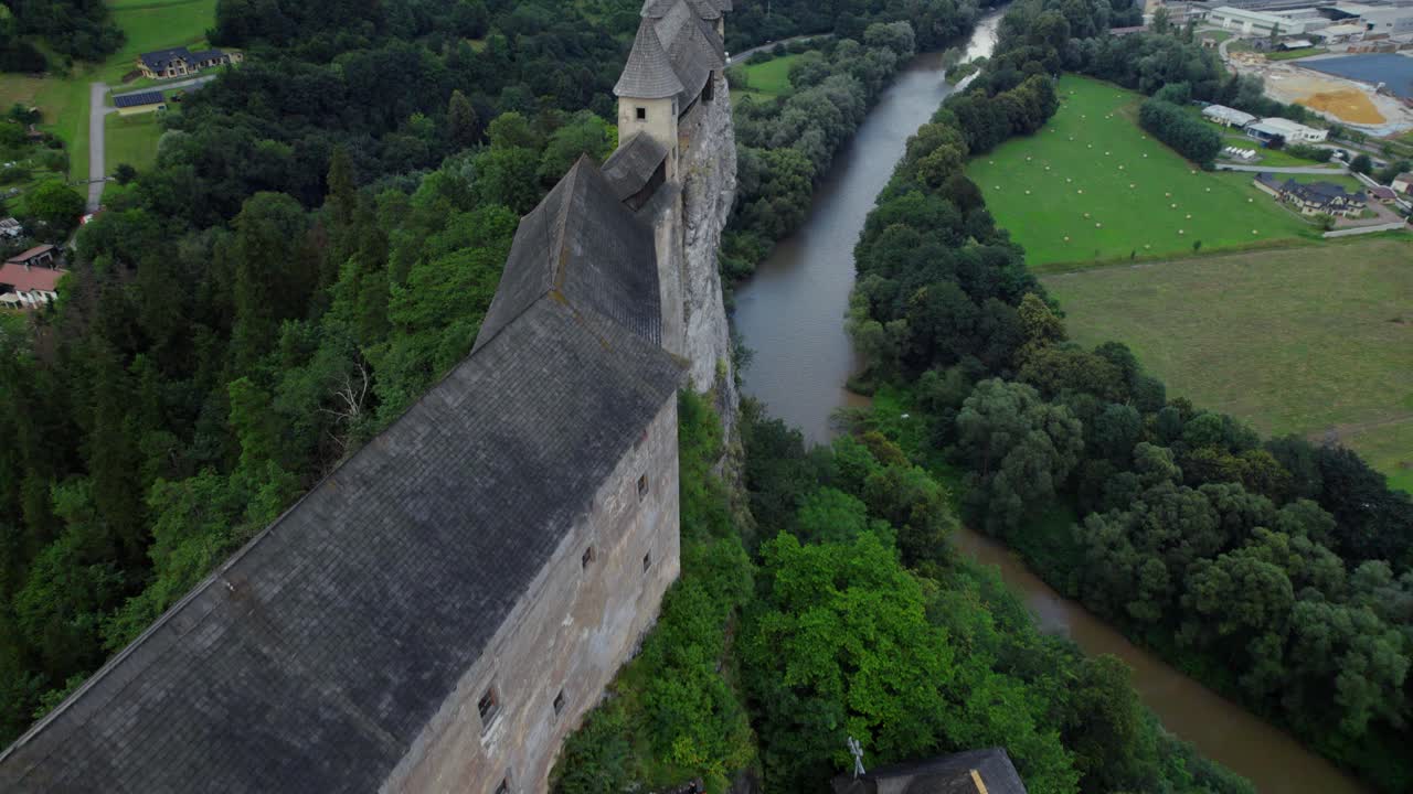Aerial view of a castle by a river