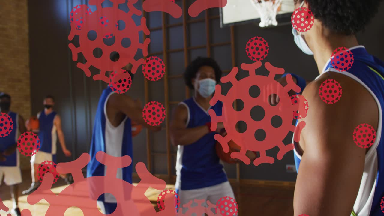 Player holding ball moving toward team at hoop sports practice starting causing red virus overlays