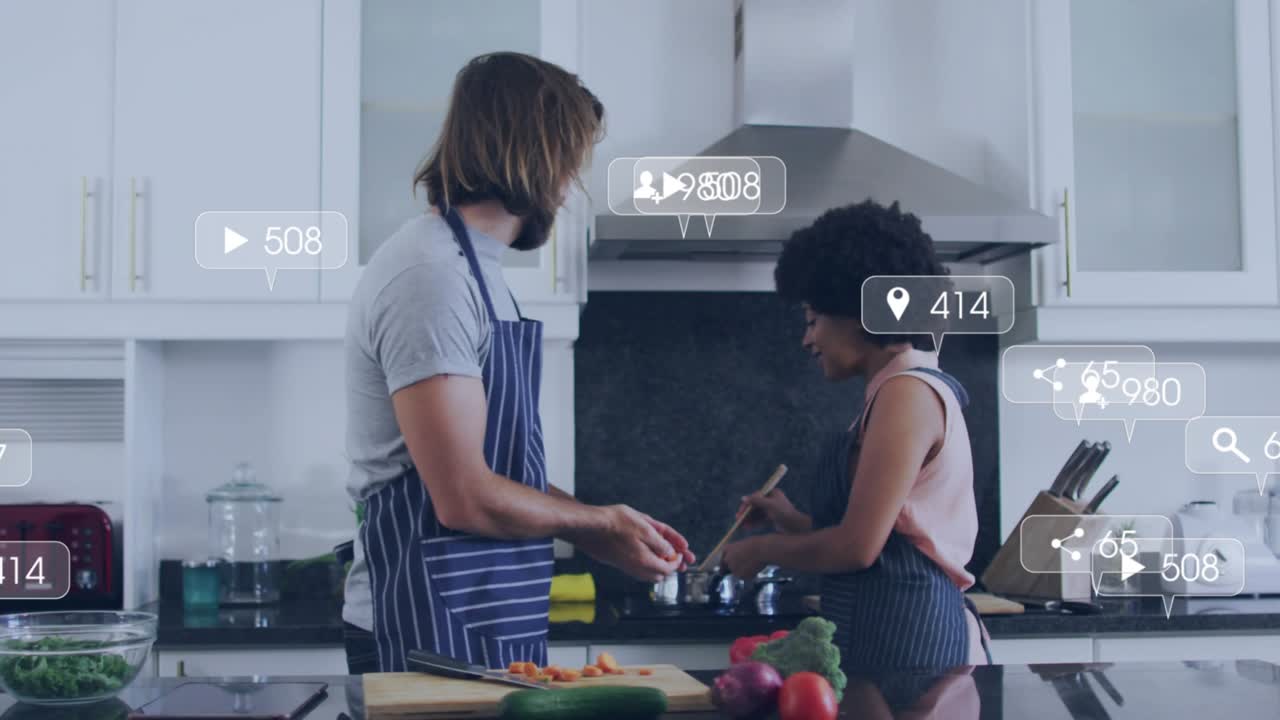 Man chopping carrots, woman stirring pot in kitchen as floating marketing icons updating engagement