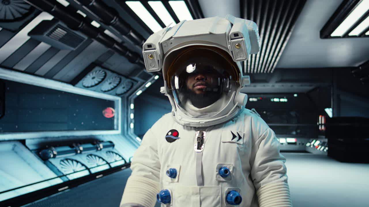 Vertical video Astronaut wearing helmet inside space station preparing for mission outside