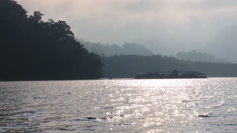 sunrise over a calm lake with reflections