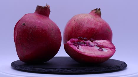 Fresh-pomegranate-rotating-on-a-turntable