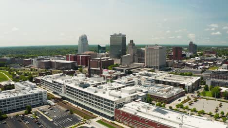 A-push-drone-shot-of-the-Winston-Salem-skyline-in-North-Carolina-in-the-summer
