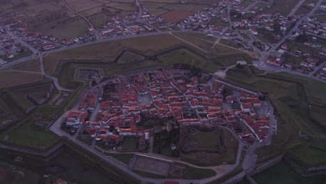 Aerial-view-of-Almeida,-a-medieval-city,-one-of-the-historic-villages-of-Portugal-during-sunrise