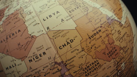 close-up of a vintage world globe focusing on the african region