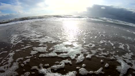 sandy beach with waves, north sea, jütland, sondervig, denmark, 4k