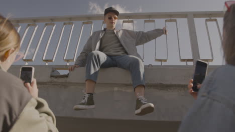 Young-man-sitting-on-the-road