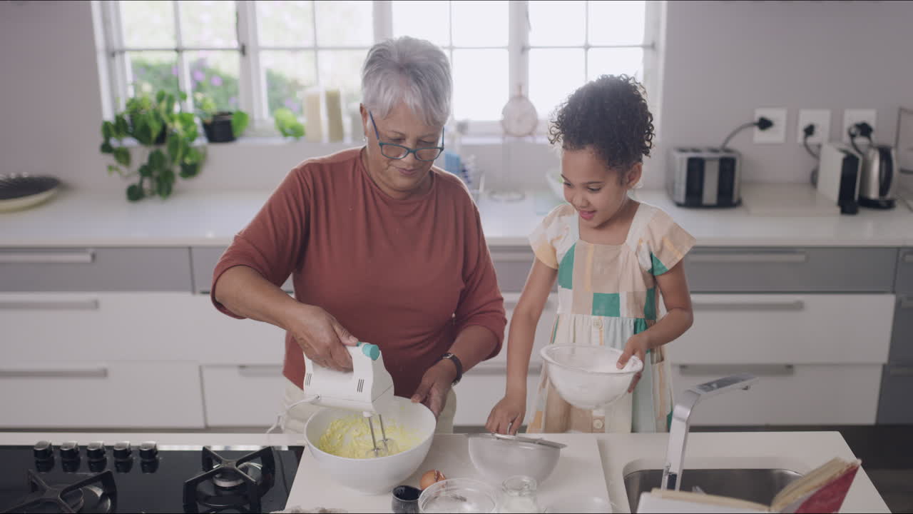 Grandmother and child baking