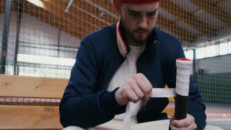 jugador de tenis lesionado