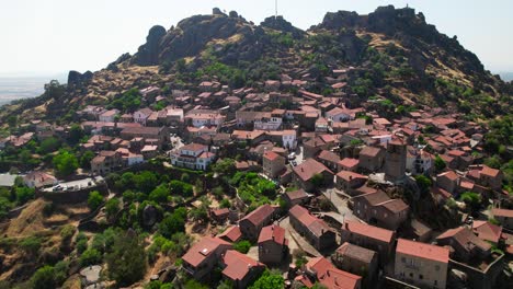 drone shot village of monsanto in portugal
