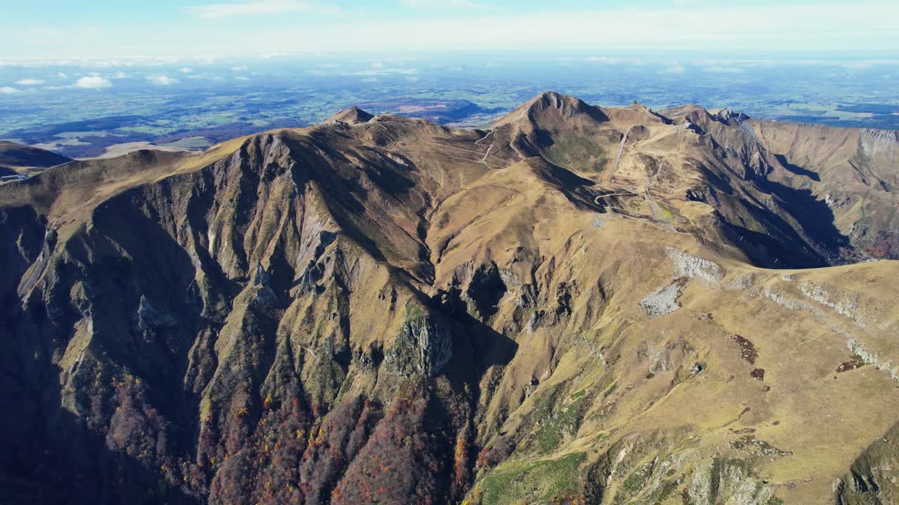 Explore Auvergne's scenic volcanoes, perfect for hiking and adventure seekers