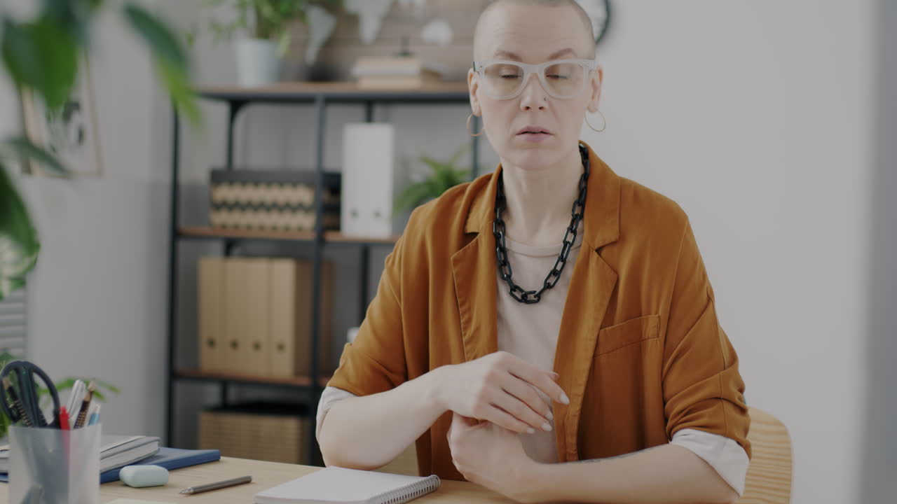 Woman Giving a Presentation in Office Setting