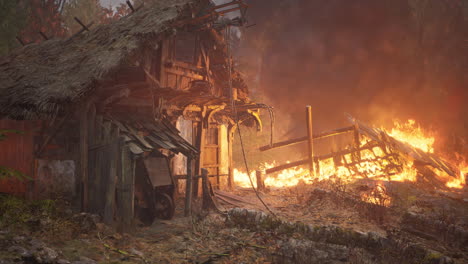 burning wooden house in old village