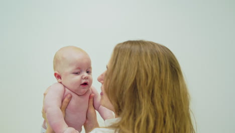 doctor checking up baby. doctor examing baby with stethoscope