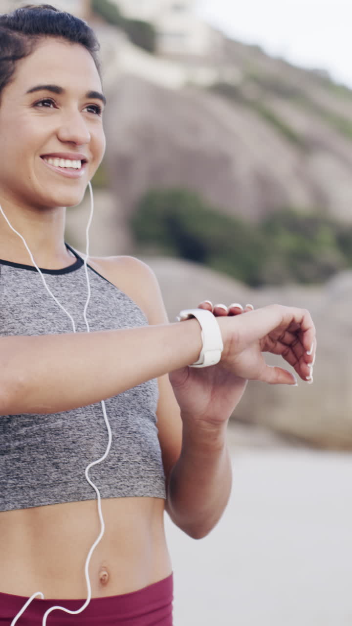 Happy Young Woman Checking Smartwatch While Exercising Outdoors