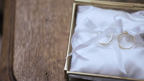 wedding rings in decorated box on the altar in church