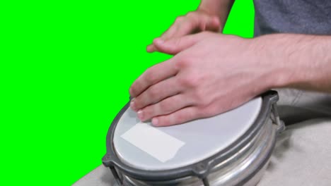 mid section of drummer playing drum