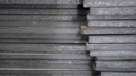 metal recyclables are neatly arranged. appearance is old. tilt shot from bottom to top.