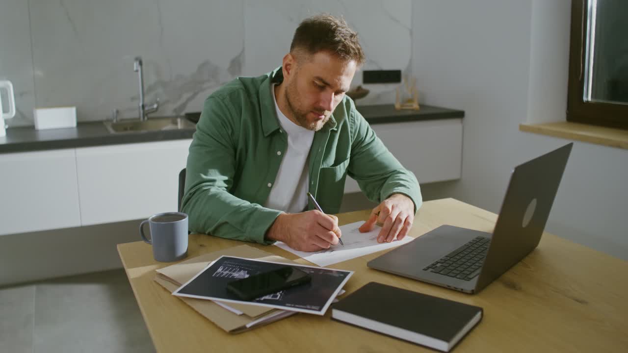 Man working from home in the kitchen
