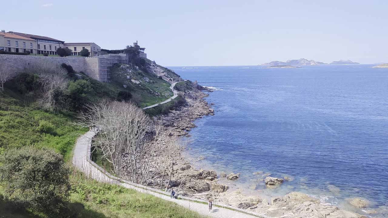 Historic stone architecture of Monterreal Castle (Castillo de Monterreal) in Baiona, Galicia. The clip shows part of the medieval fortress, a landmark on Spain's Atlantic coast.