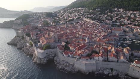 drone view of historic dubrovnik old town and its fortified stone walls, croatia