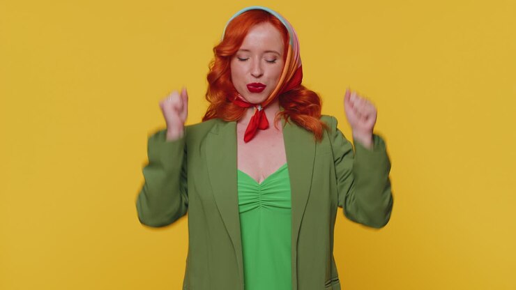 Stylish woman in jacket shouting, celebrating success, winning, birthday, lottery goal achievemen