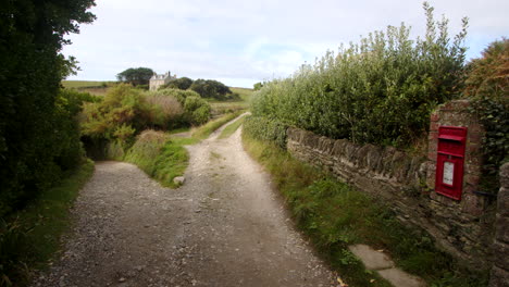 Country Lane, with old postbox in Stonewall at Bessy&#039;s Cove, The Enys, cornwall
