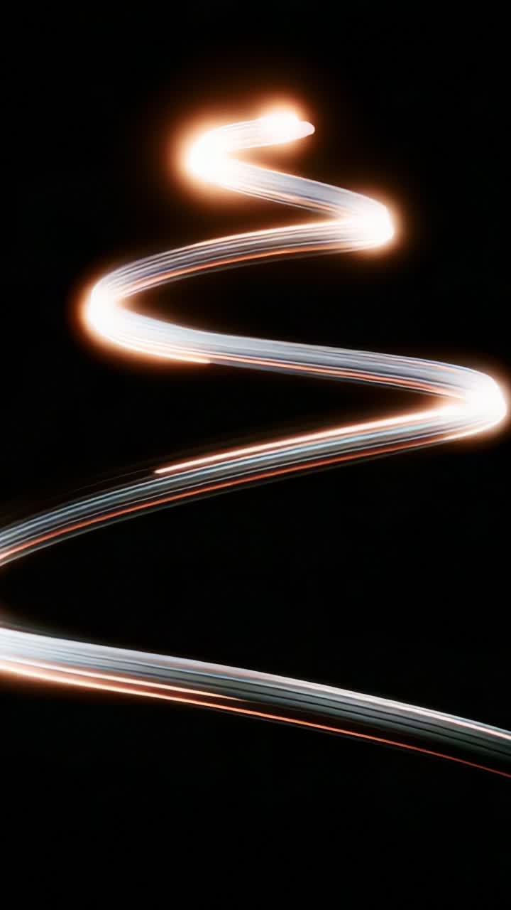 A Captivating Journey Through Light Trails: Discovering the Beautiful Spiral Patterns Created by Motion with Vibrant Colors Against a Dark Background in Two Stunning Frames