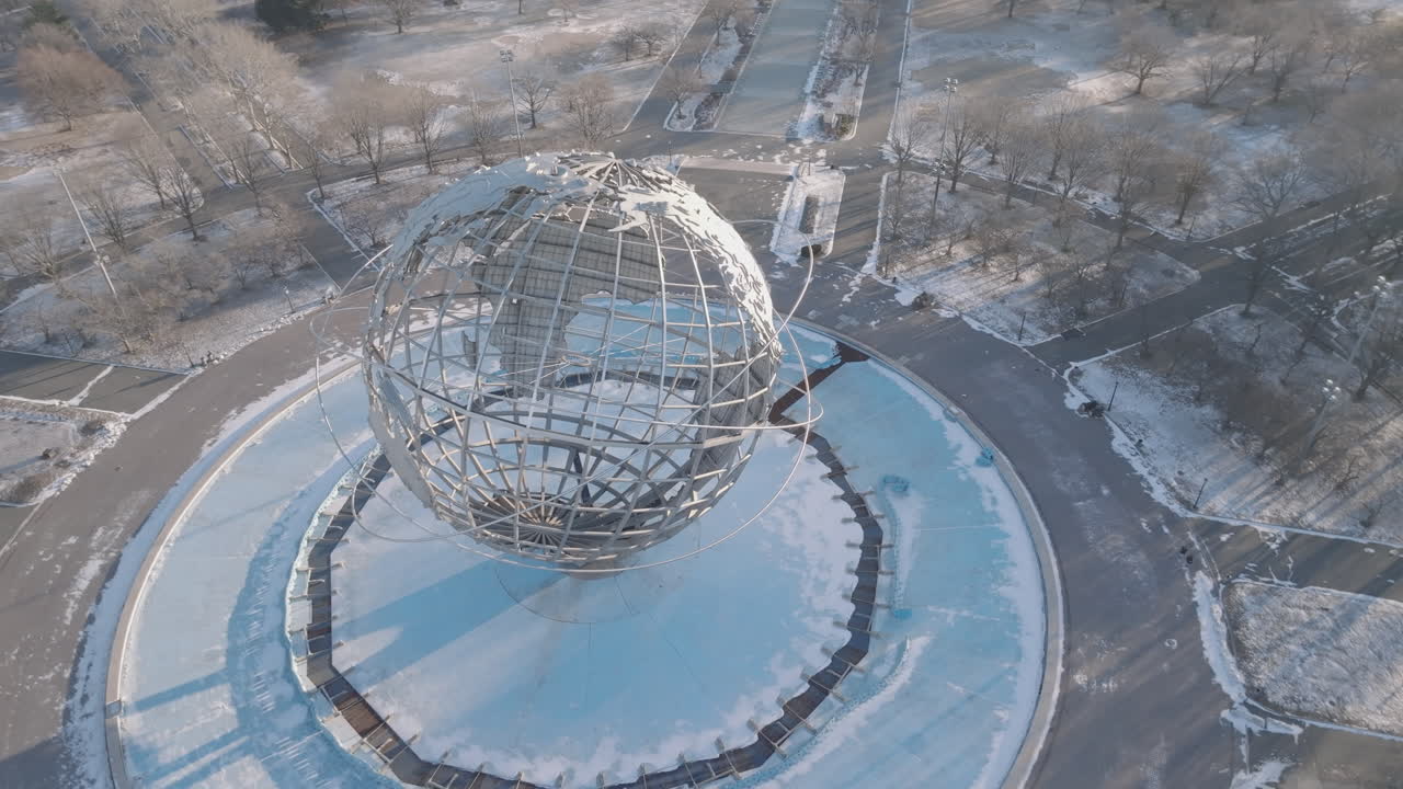 Aerial view of The Unisphere in Flushing Meadows Corona Park. Shot on a winter morning in Queens, New York City.