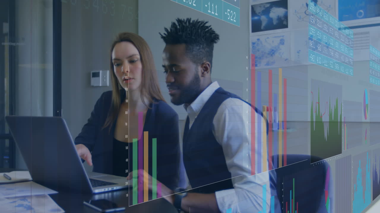 Animation of data processing over diverse businessman and businesswoman discussing at office