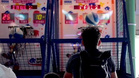 players compete in an arcade basketball challenge