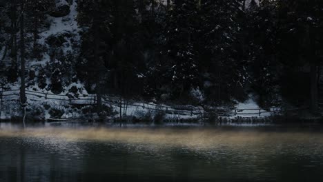 Captivating-mist-over-a-serene-lake-captures-the-essence-of-dawn's-tranquility