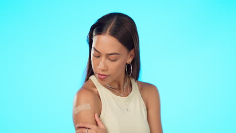 plaster, vaccine and woman in studio