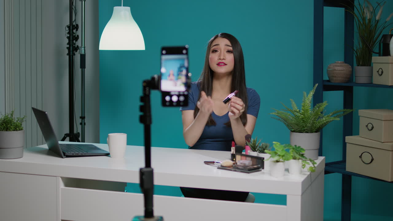 Content creator doing product review on camera in studio