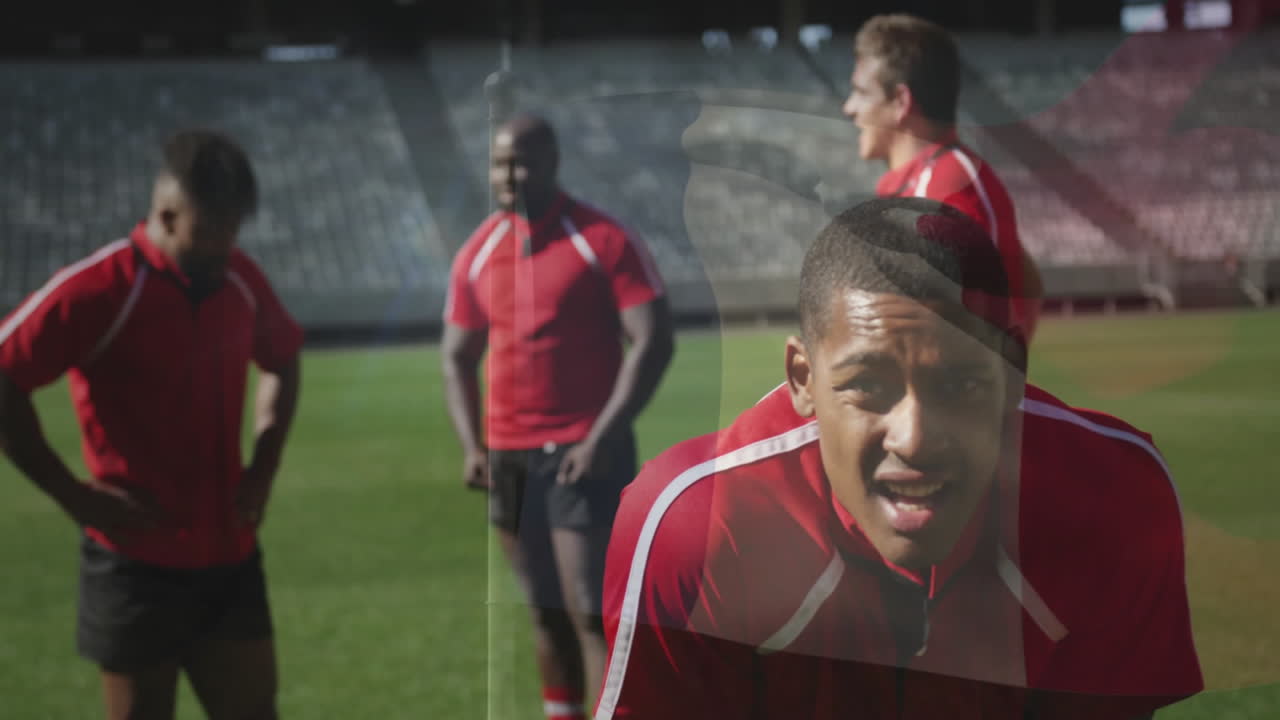 In red uniforms, rugby players standing on field, preparing for game animation