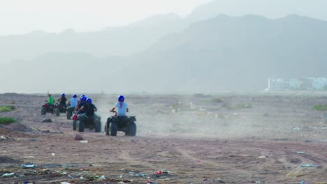 safari with a group of beach buggies with a mountain view