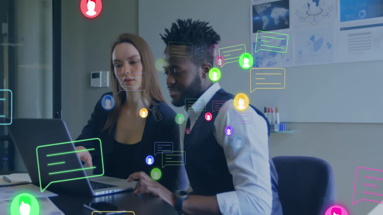 Animation of profile and message icons on diverse businessman and businesswoman discussing at office