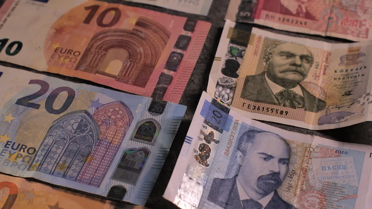 Bulgaria change currency, Bulgaria Lev to Euro. Money exchange. Paper banknotes on table. Concept, economy, competition, crisis, banking and finance. BGN,BGL. Scene D. Close up slide shot