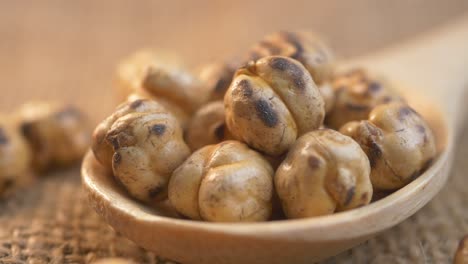 roasted chickpeas in a wooden spoon