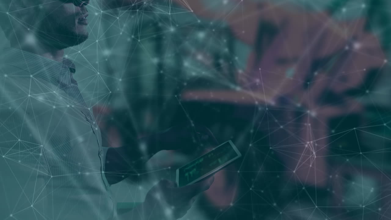 Animation of network of connections over man using tablet