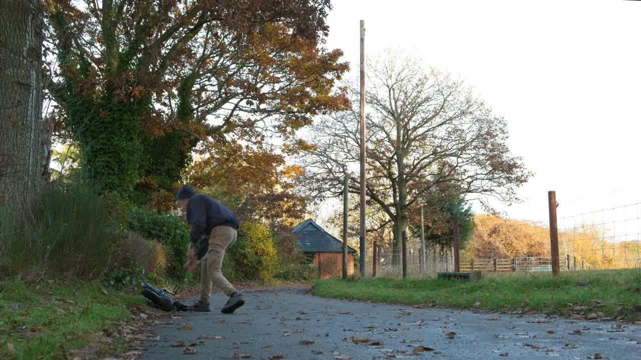 Couple watching seals near beach, calm mood, with note: one wheel seen nearby