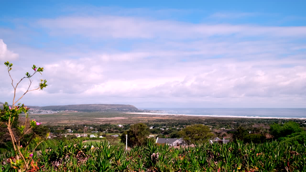 Elevated view over coastline and Noordhoek white sand beach near Cape Town