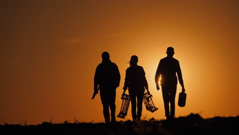 farmers at sunset