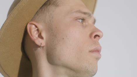 close up portrait of handsome man moving his head