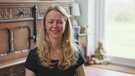 portrait of a smiling woman indoors