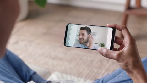 young-woman-having-video-chat-using-smartphone-at-home-chatting-to-boyfriend-showing-off-hairstyle-sharing-lifestyle-enjoying-long-distance-relationship